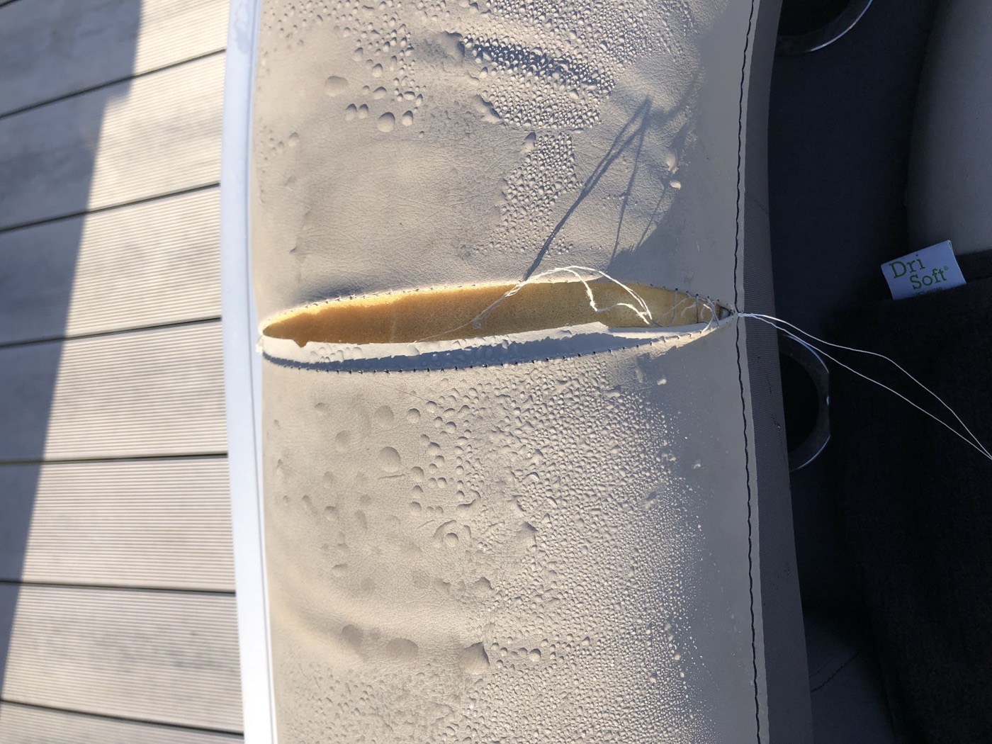 White upholstery with an open seam