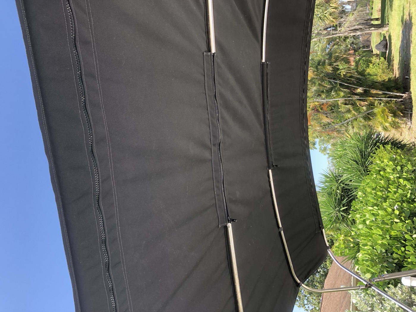 Black bimini top over the cockpit